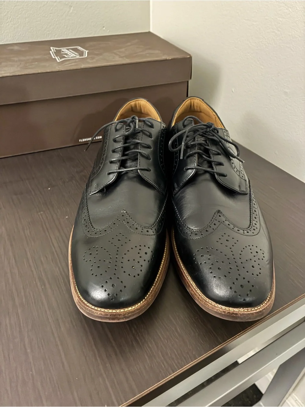Florsheim Black Leather Wingtip Oxfords with Brown Sole Trim